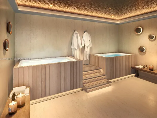 a living room with patio furniture and a large window