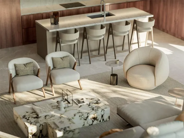 a living room with furniture and a table