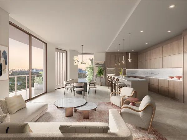 a living room with couches and a dining table with kitchen view