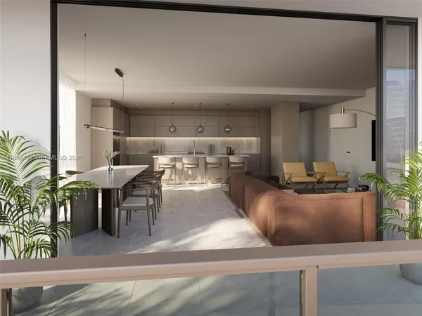 a kitchen with furniture and a table