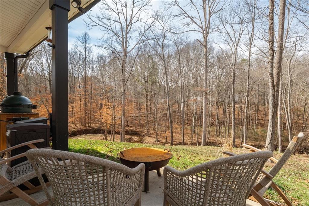 14 Cambridge Lane Bremen, GA 30110 - Photo 38 of 51 a view of an outdoor sitting area with furniture and garden