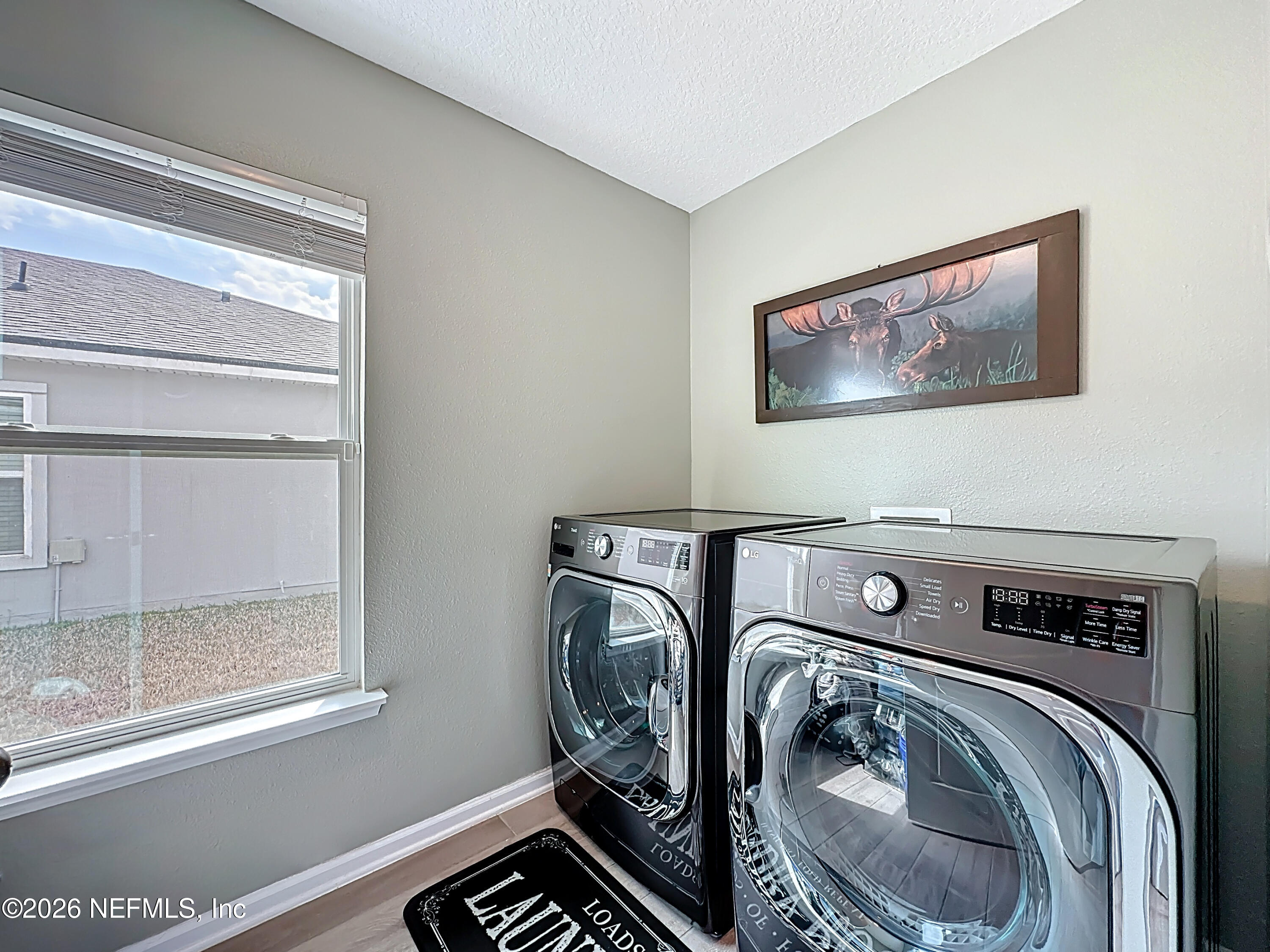 65849 Edgewater Drive Yulee, FL 32097 - Photo 19 of 36 Spacious Laundry Room