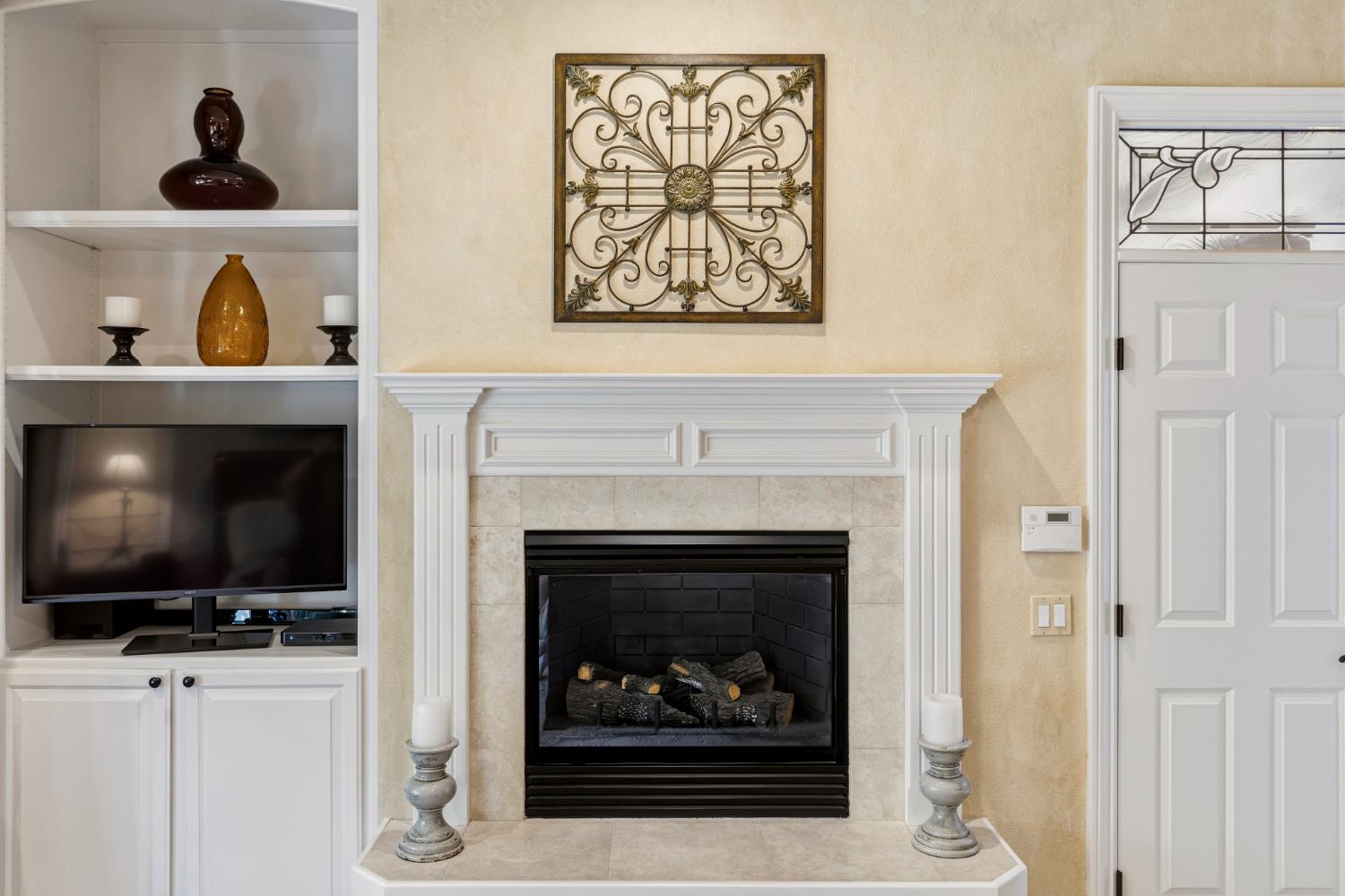 5869 Granite Hills Drive South Granite Bay, CA 95746 - Photo 29 of 66 a living room with furniture and a fireplace