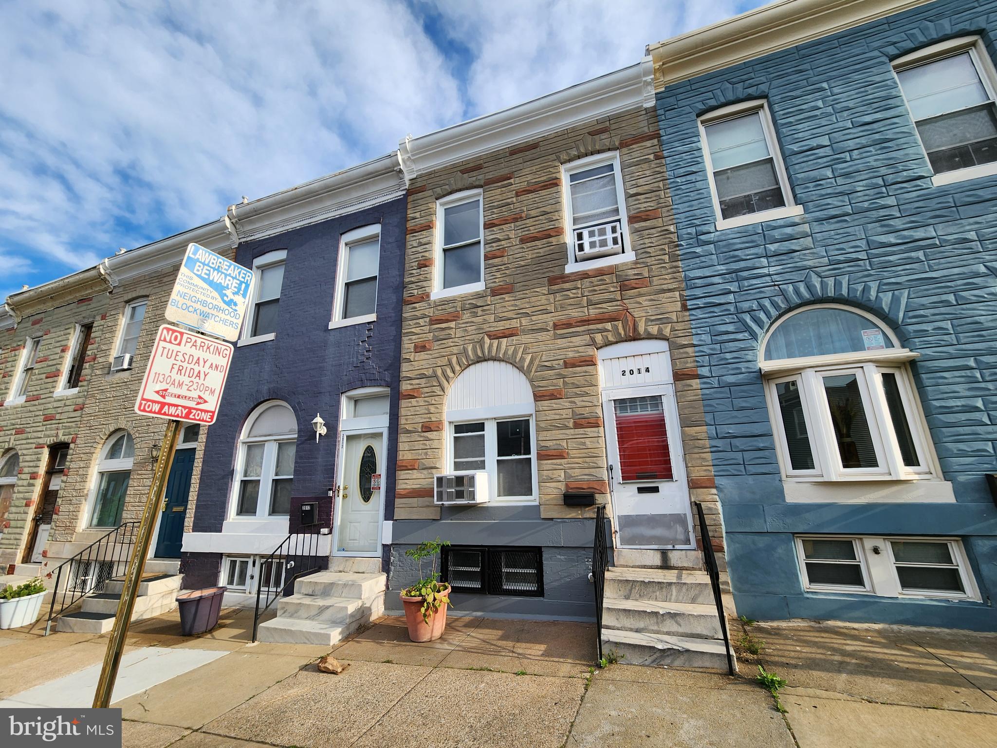 2014 East Lanvale Street Baltimore, MD 21213 - Photo 2 of 32 a front view of a house with glass windows