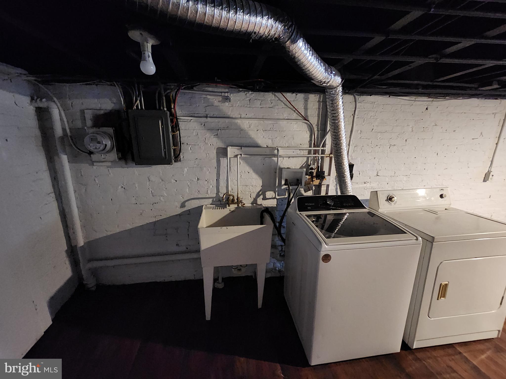 2014 East Lanvale Street Baltimore, MD 21213 - Photo 22 of 32 a utility room with dryer and washer