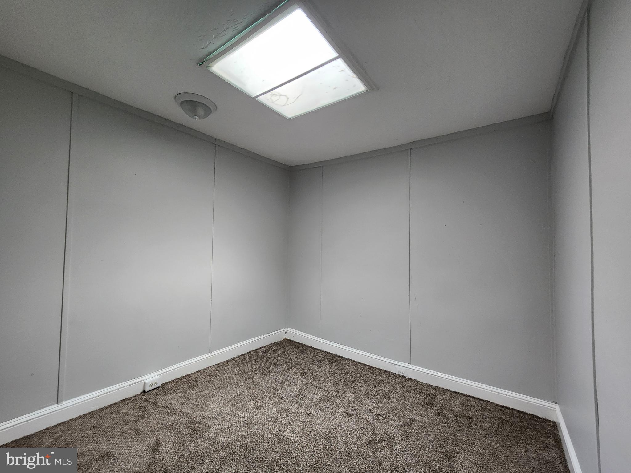 2014 East Lanvale Street Baltimore, MD 21213 - Photo 30 of 32 an empty room with a empty space and window