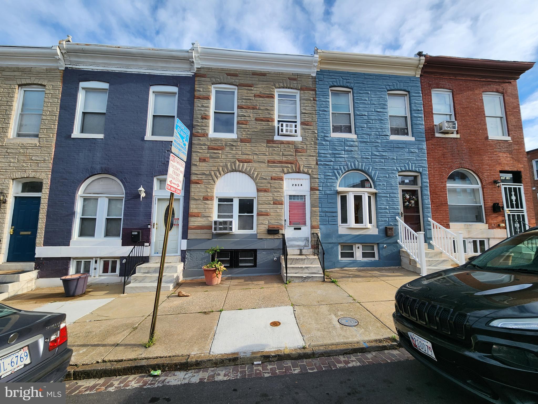 2014 East Lanvale Street Baltimore, MD 21213 - Photo 3 of 32 a view of multiple houses with a yard