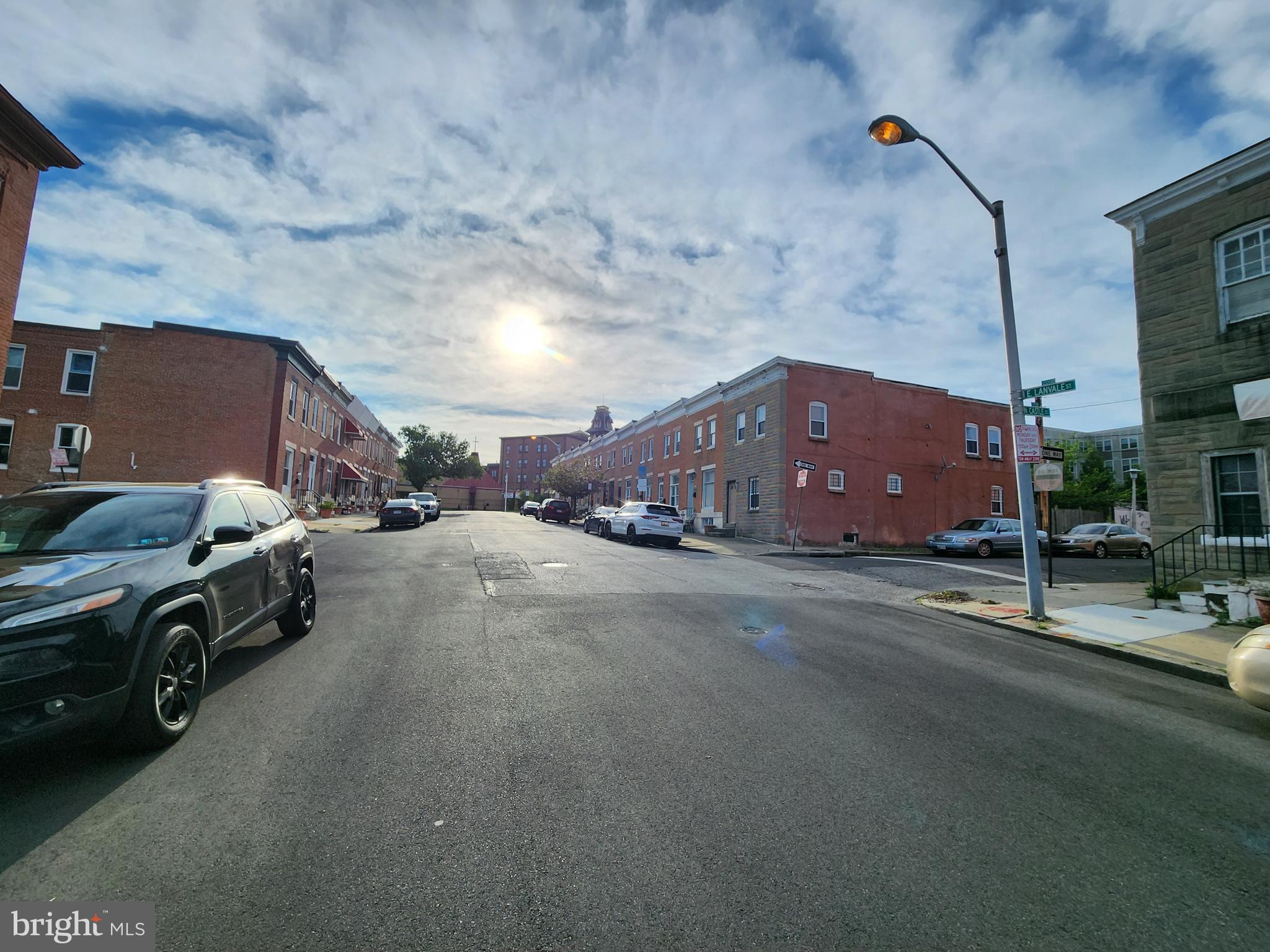 2014 East Lanvale Street Baltimore, MD 21213 - Photo 5 of 32 a view of a street with cars