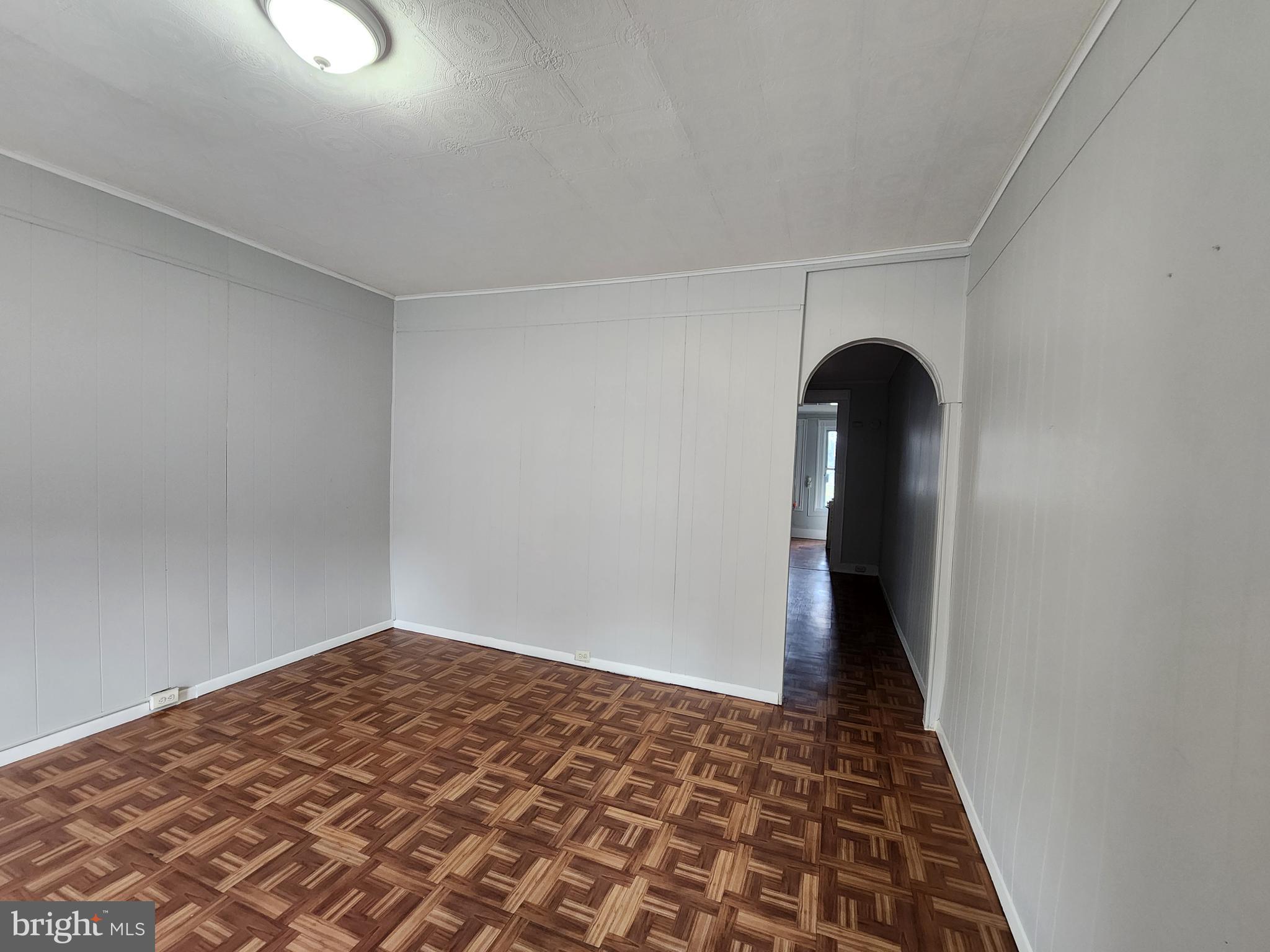 2014 East Lanvale Street Baltimore, MD 21213 - Photo 7 of 32 a view of an empty room and window