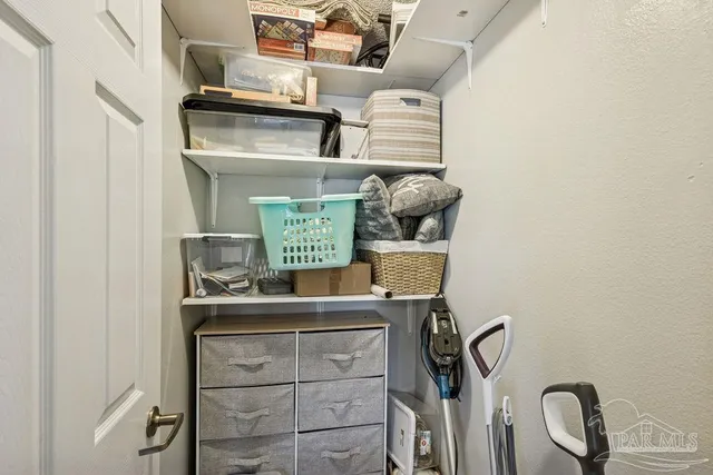 a view of storage and utility room