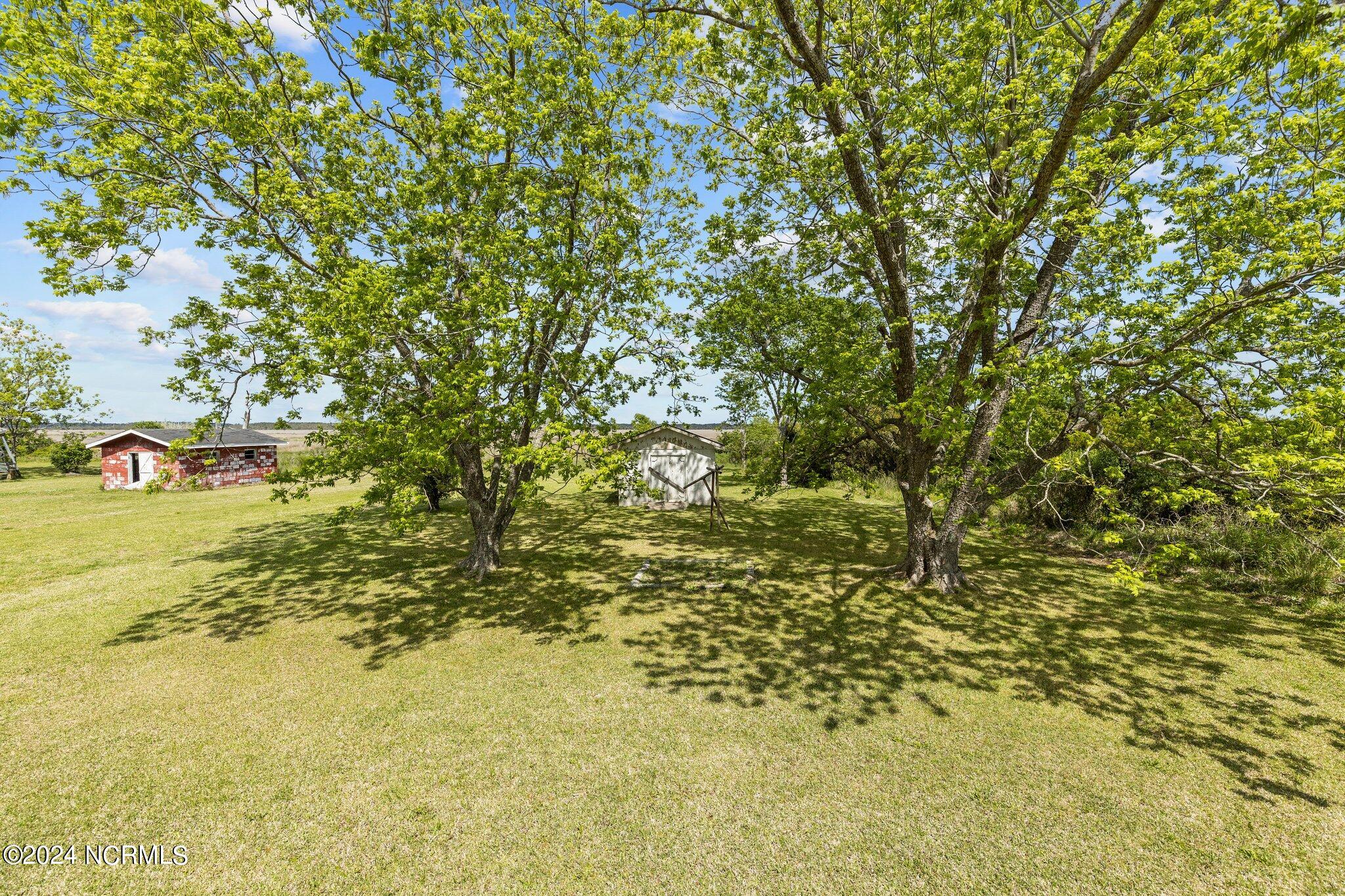 1154 Merrimon Road Beaufort, NC 28516 - Photo 33 of 46 Backyard for Relaxing and Entertaining