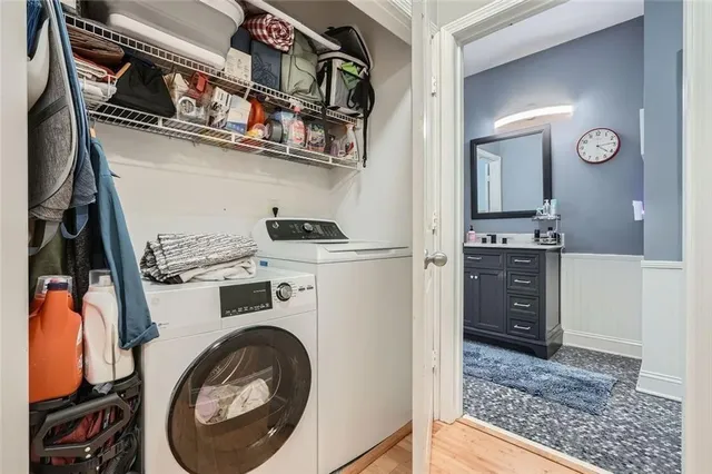 a view of a kitchen with washer and dryer