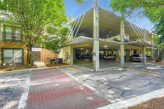 a view of a street with sitting area