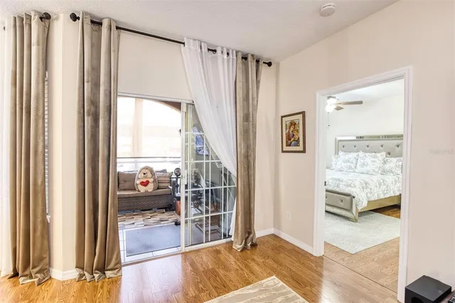 a view of a living room with a large window