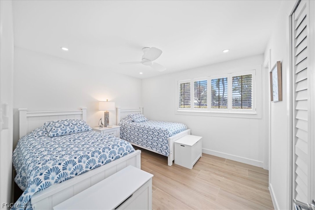 72 7th Street South, Unit 112 Naples, FL 34102 - Photo 15 of 28 a bedroom with a bed and a window