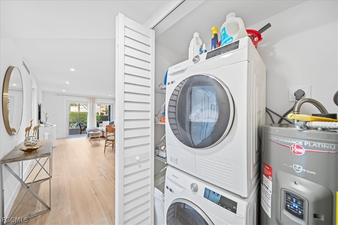 72 7th Street South, Unit 112 Naples, FL 34102 - Photo 16 of 28 a view of a room with washer and dryer