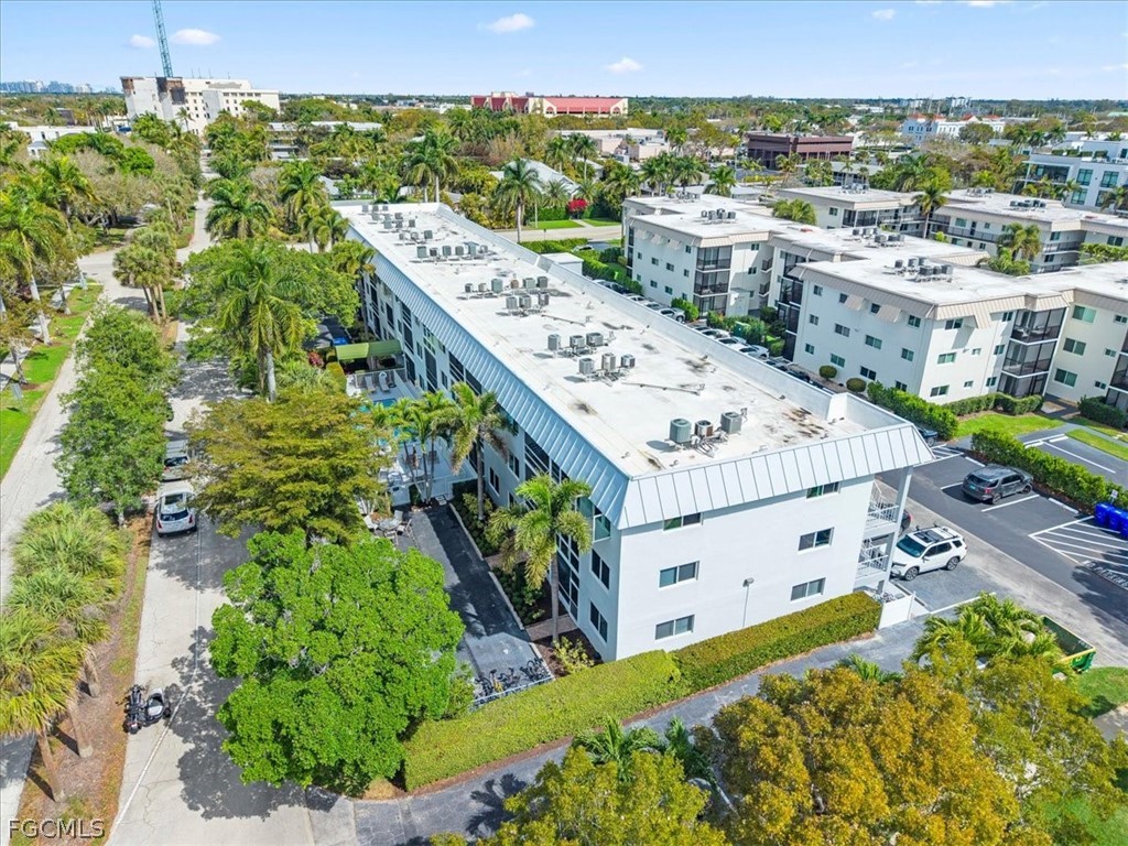 72 7th Street South, Unit 112 Naples, FL 34102 - Photo 23 of 28 a view of a balcony with an ocean