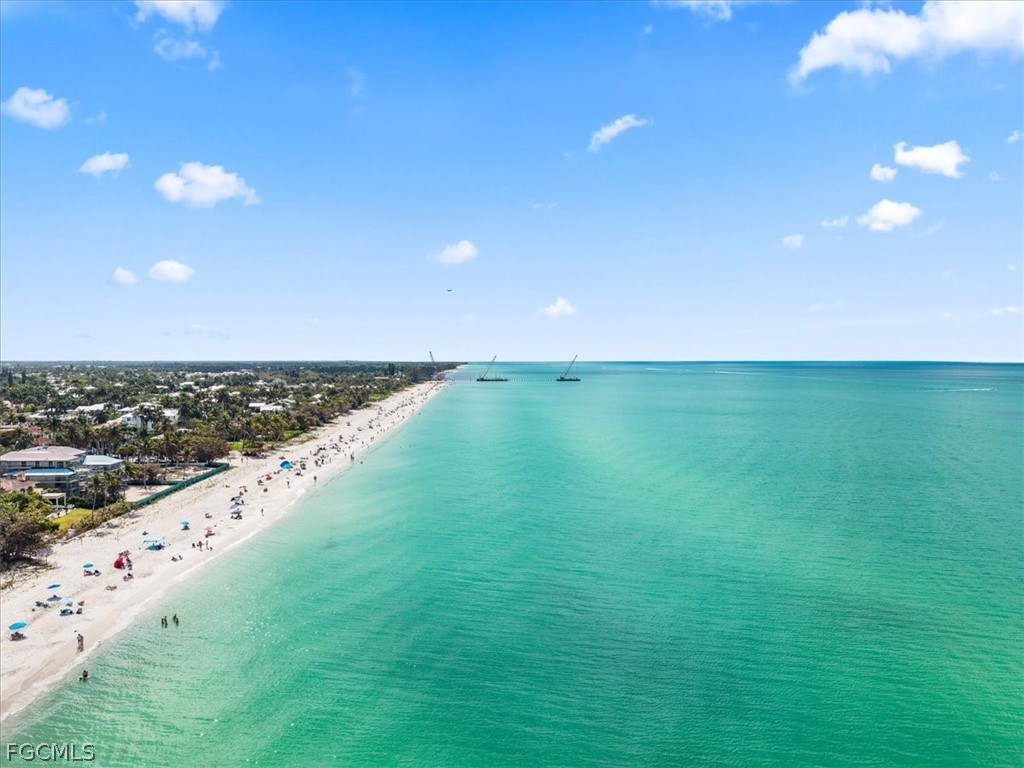 72 7th Street South, Unit 112 Naples, FL 34102 - Photo 26 of 28 a view of a field with an ocean