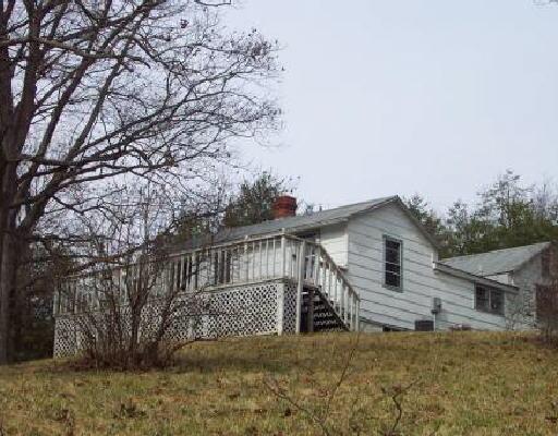 3967 Bore Auger Road Blue Ridge, VA 24064 - Photo 1 of 1 a view of a house with a yard