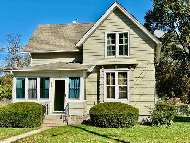 a view of a house with garden
