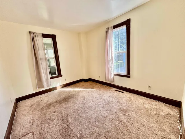 a view of empty room with front door