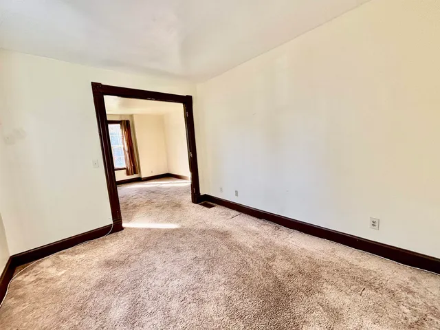 a view of an empty room with window