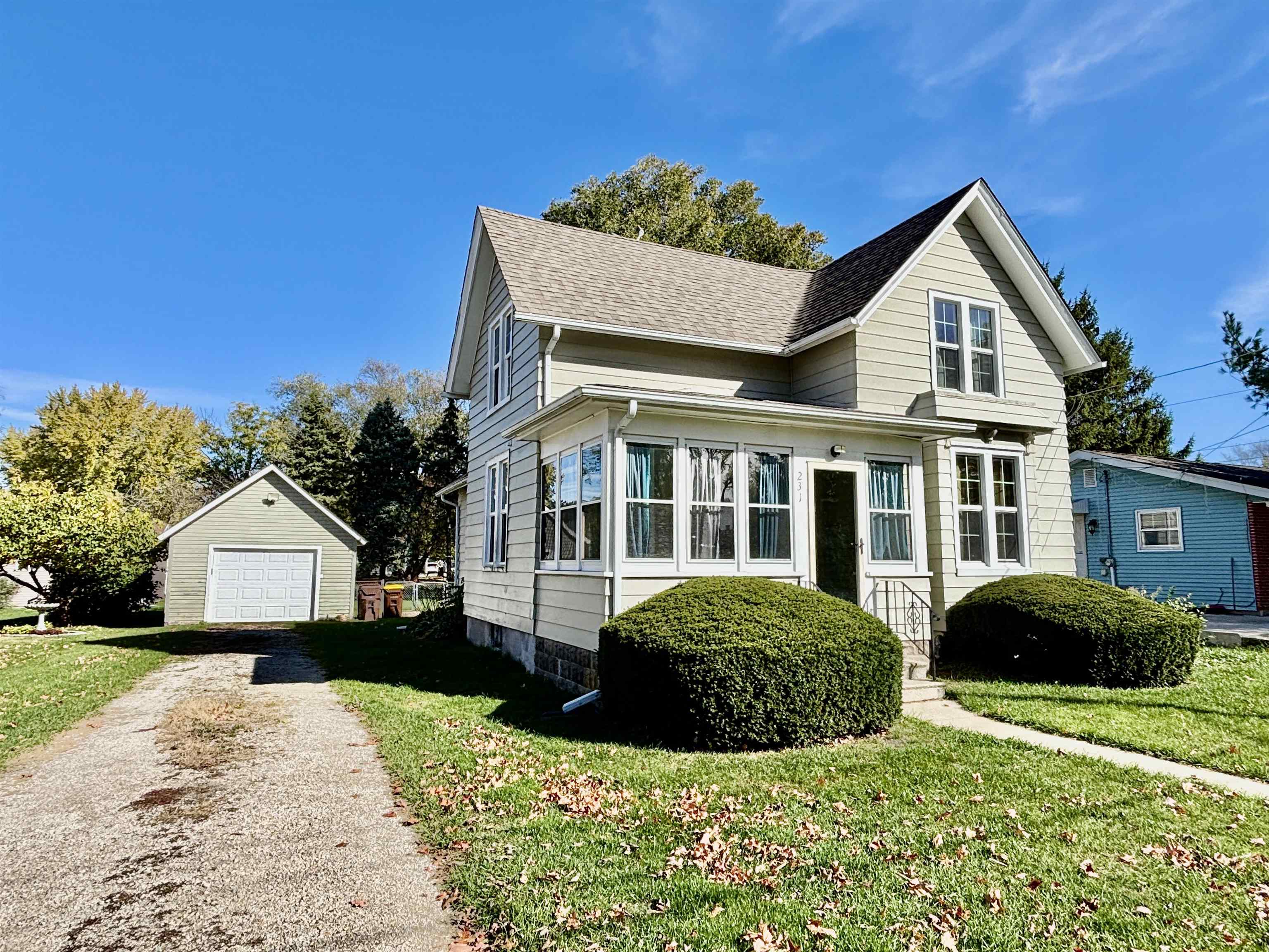 231 Bennett Street Belvidere, IL 61008 - Photo 2 of 24 a front view of a house with a yard