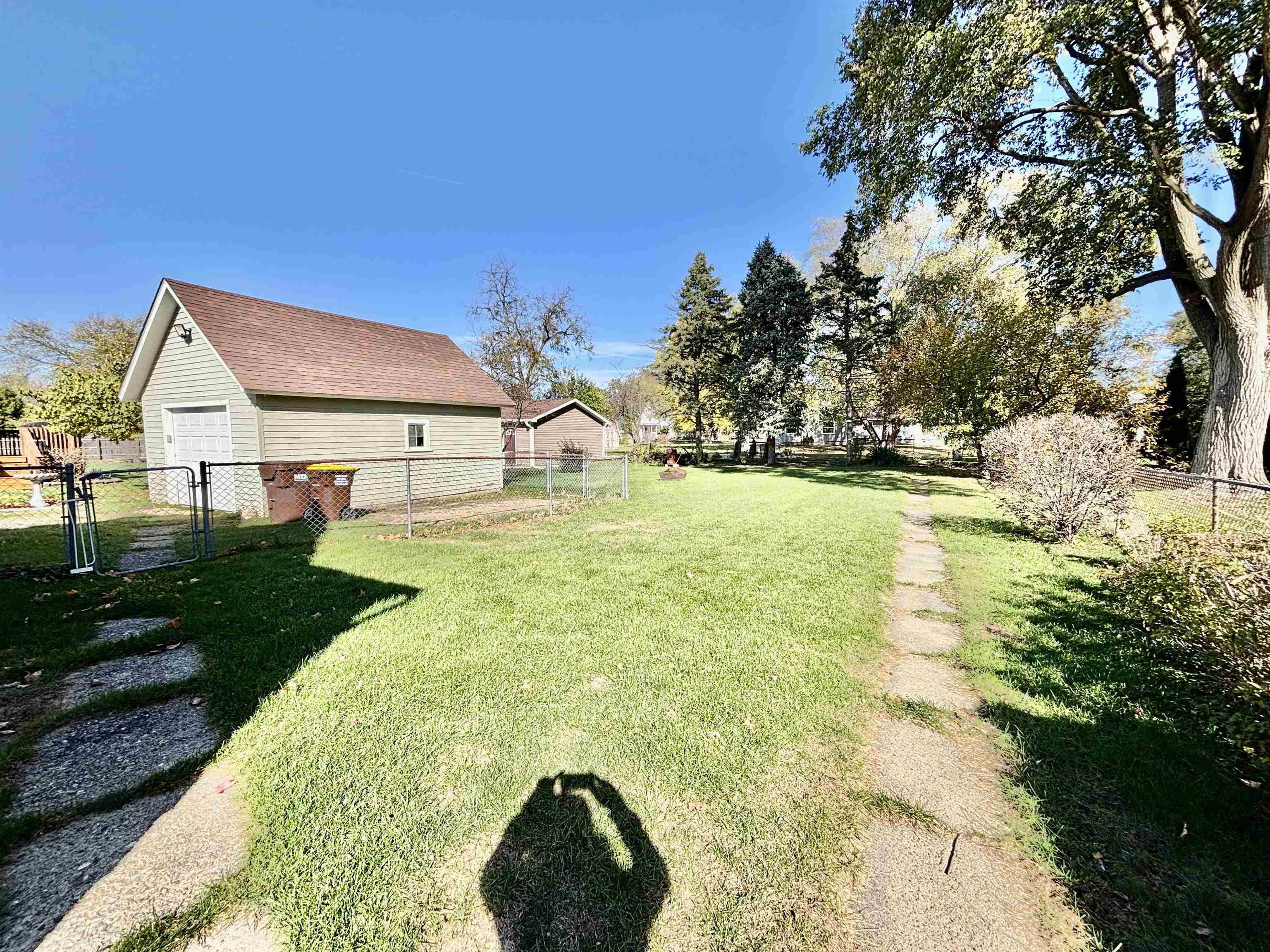 231 Bennett Street Belvidere, IL 61008 - Photo 24 of 24 a view of swimming pool with a yard