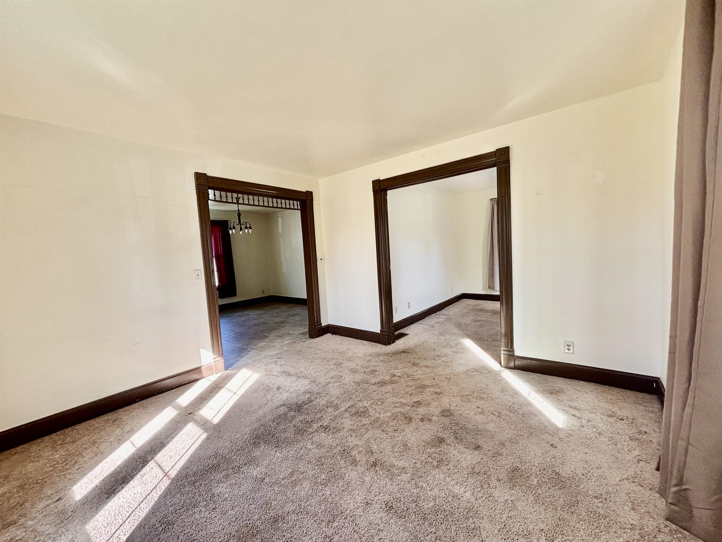 231 Bennett Street Belvidere, IL 61008 - Photo 6 of 24 an empty room with windows