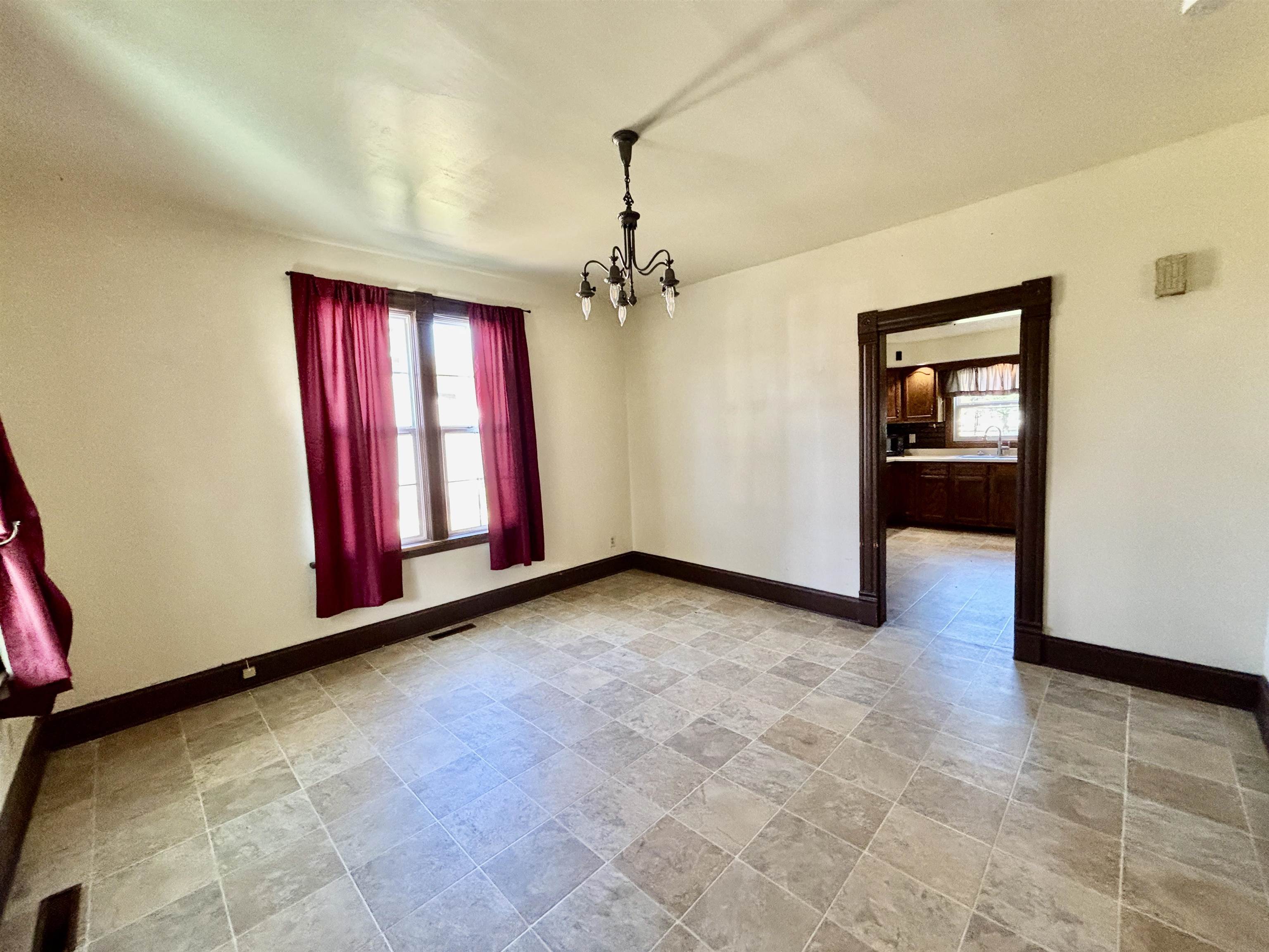 231 Bennett Street Belvidere, IL 61008 - Photo 8 of 24 a view of a room with window and hardwood floor