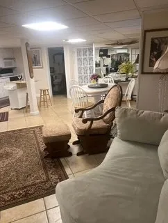a living room with furniture and a couch