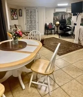 a view of a dining room with furniture