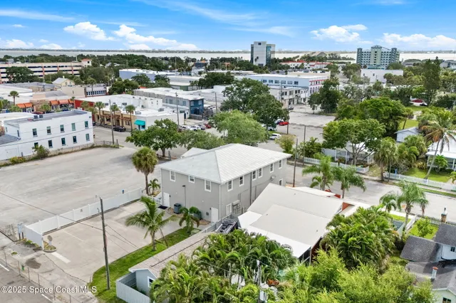 a view of a building with sitting area