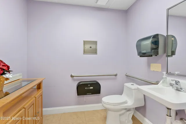 a view of a livingroom with furniture and window