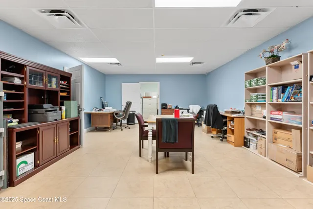 a bathroom with a sink a toilet and shower curtain