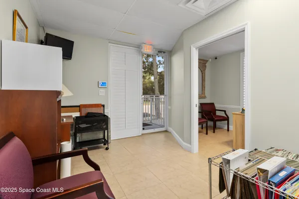 a kitchen with stainless steel appliances granite countertop a stove top oven a sink refrigerator and cabinets
