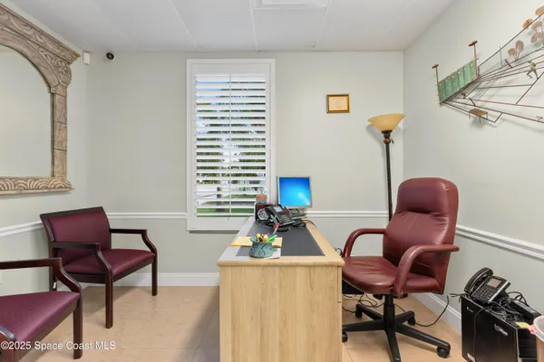 a view of a hallway with washer and dryer
