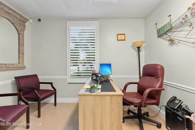 a view of a hallway with washer and dryer