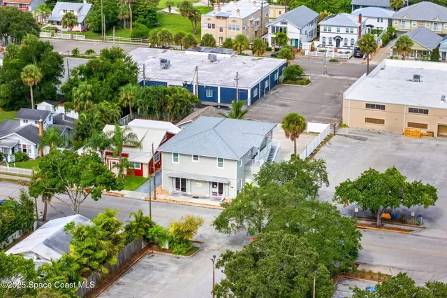 a house with trees in the background