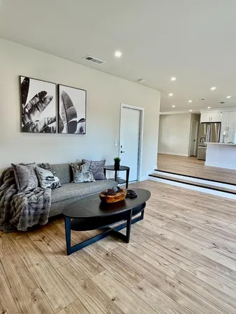 a view of kitchen with wooden floor