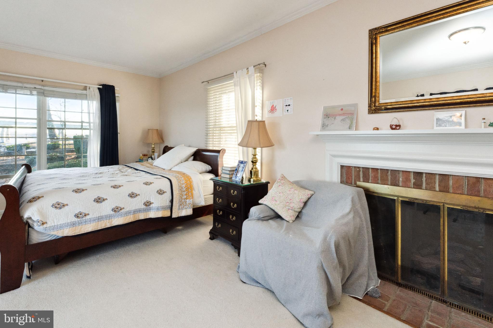 1836 Cove Point Road Annapolis, MD 21401 - Photo 13 of 36 Primary suite features gas fireplace