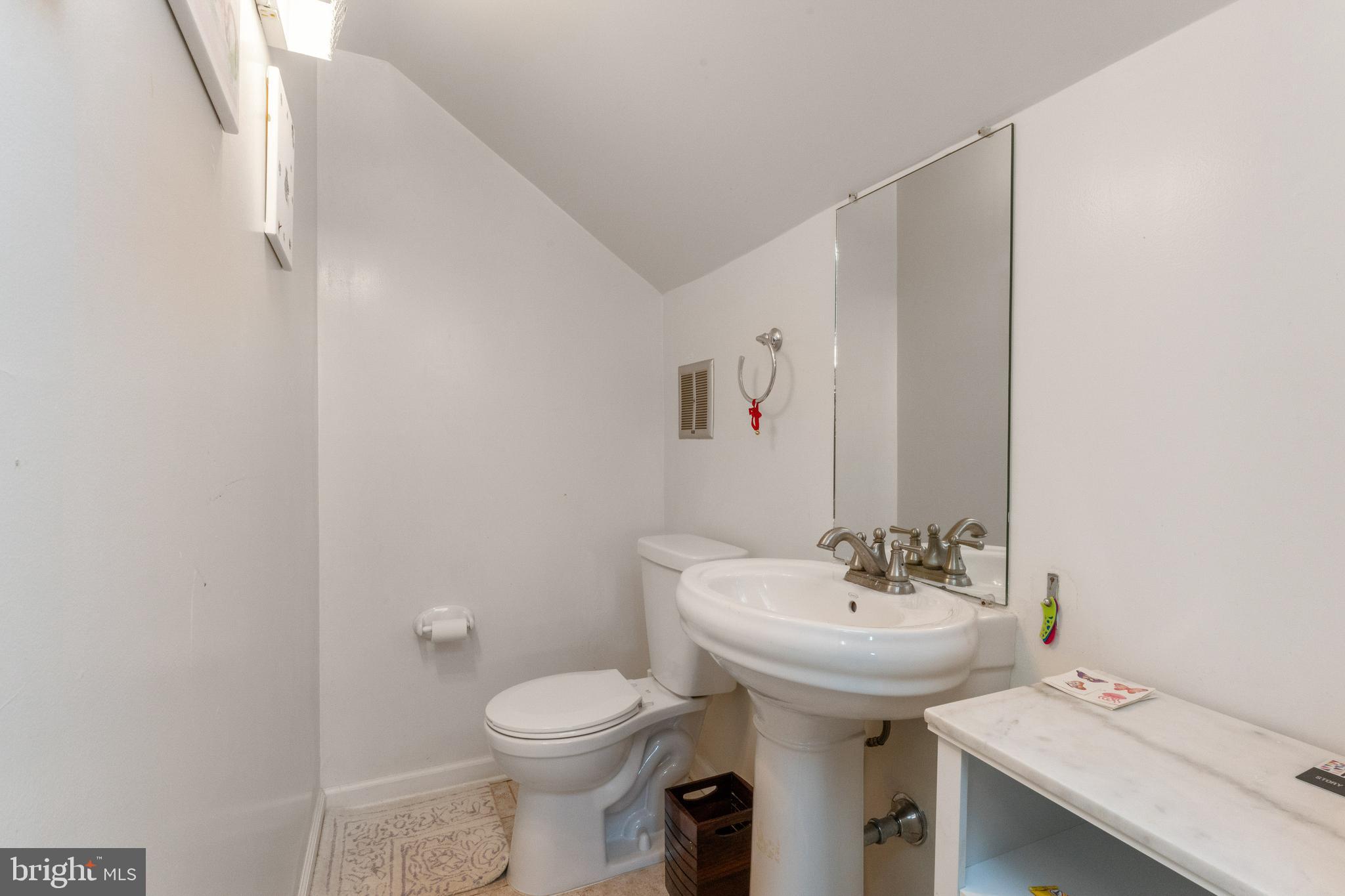 1836 Cove Point Road Annapolis, MD 21401 - Photo 15 of 36 En suite powder room on upper level