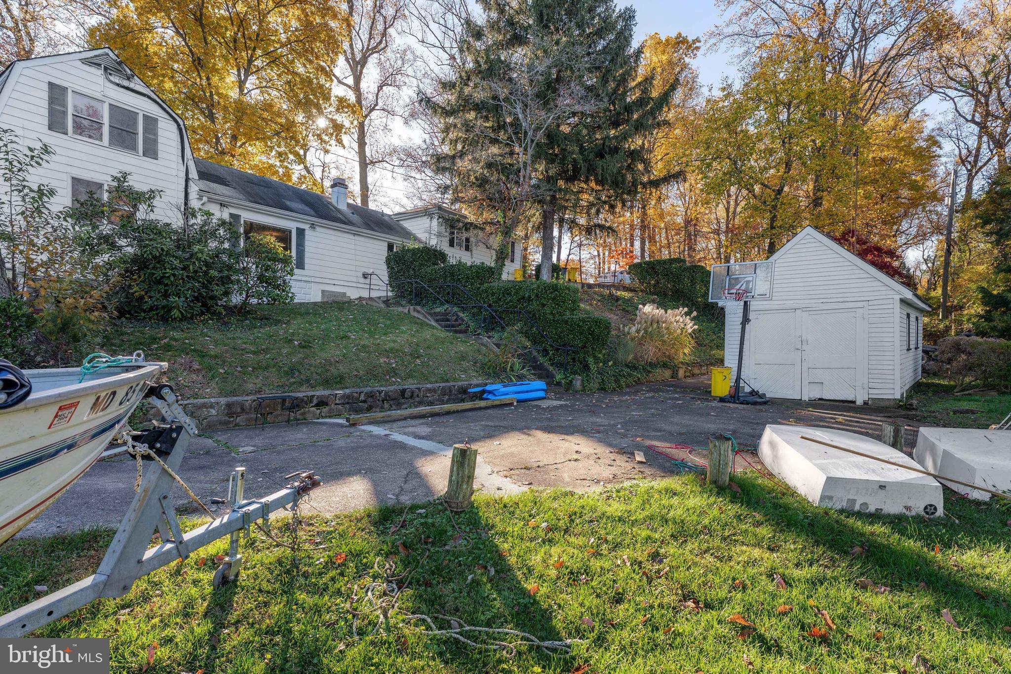 1836 Cove Point Road Annapolis, MD 21401 - Photo 21 of 36 Water's edge shed and another large patio