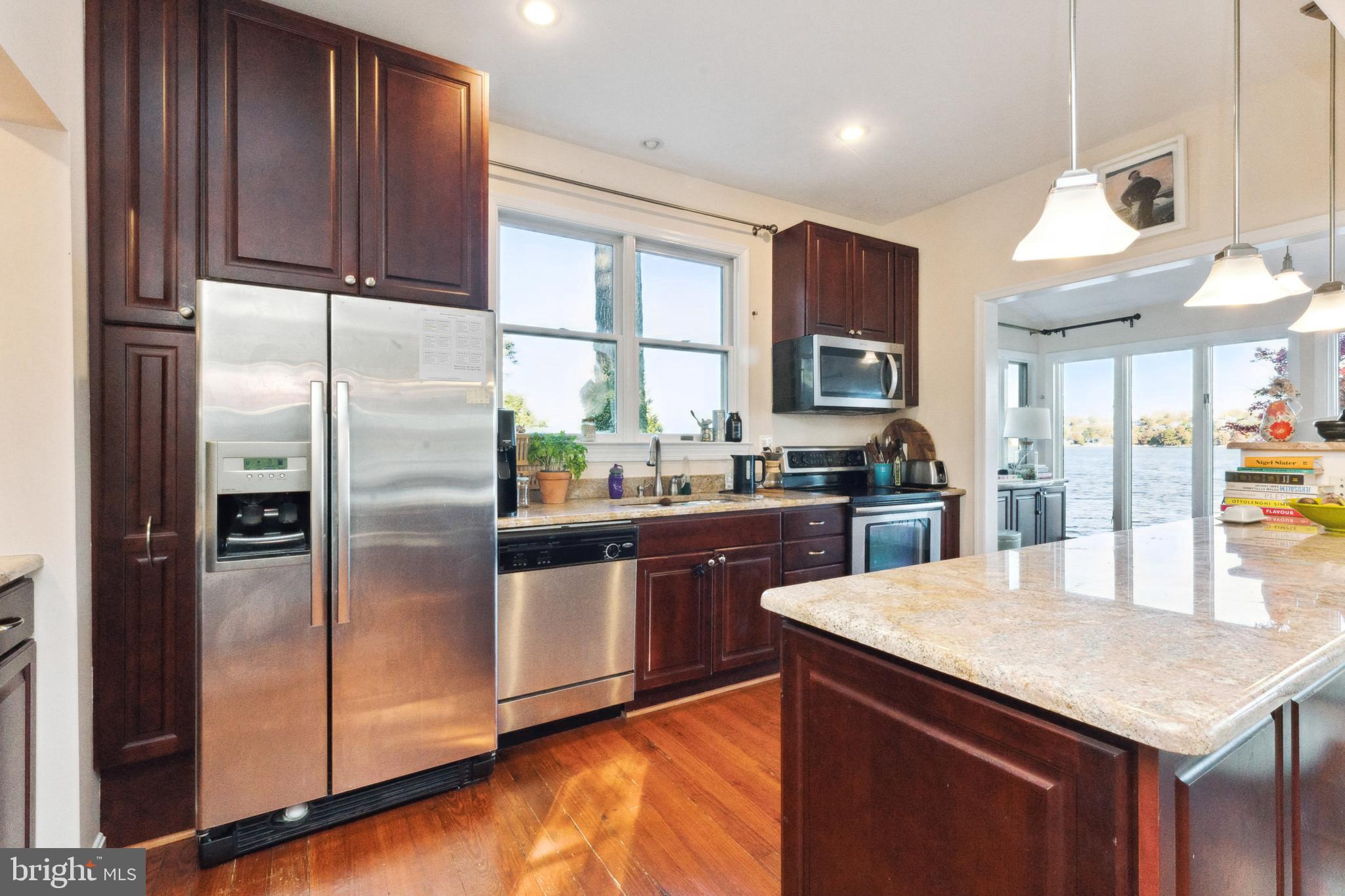 1836 Cove Point Road Annapolis, MD 21401 - Photo 9 of 36 Stainless appliances & granite counter tops