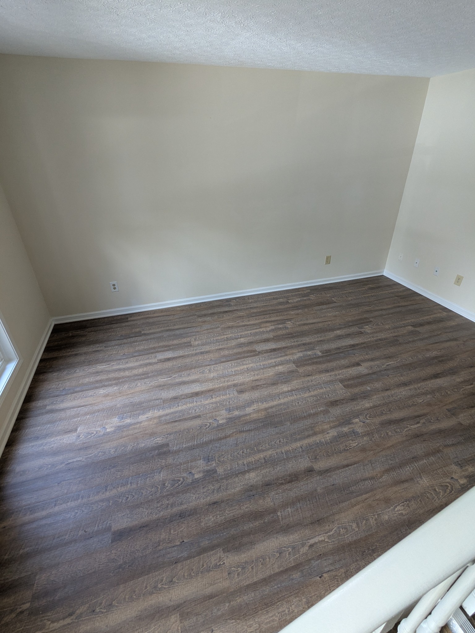 1030 Brookview Drive, Unit 21C Franklin, KY 42134 - Photo 3 of 3 a view of an empty room with wooden floor