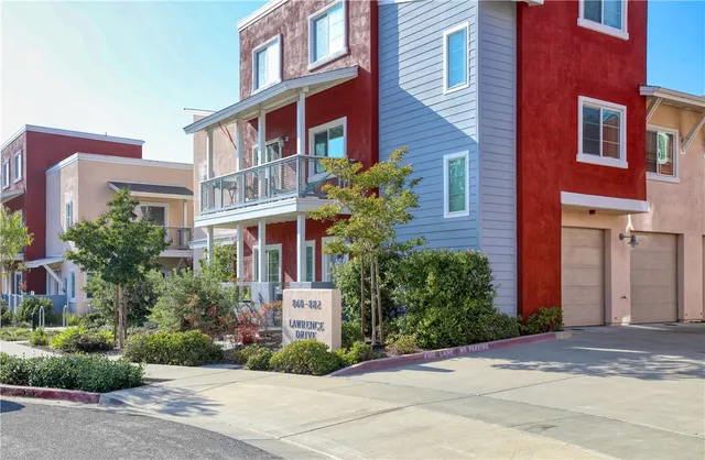 a front view of a multi story residential apartment building