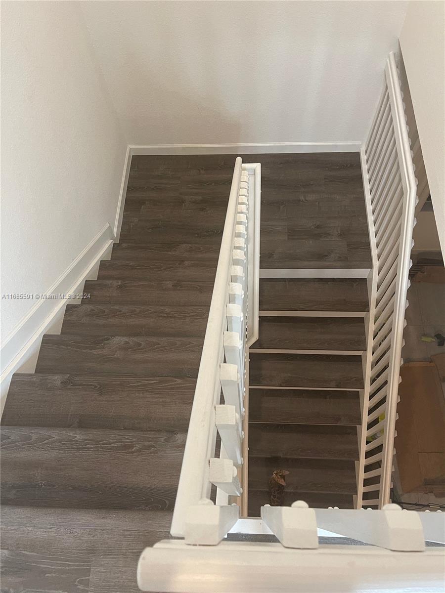 354 Northeast 210th Way Miami, FL 33179 - Photo 11 of 11 a view of entryway with wooden floor