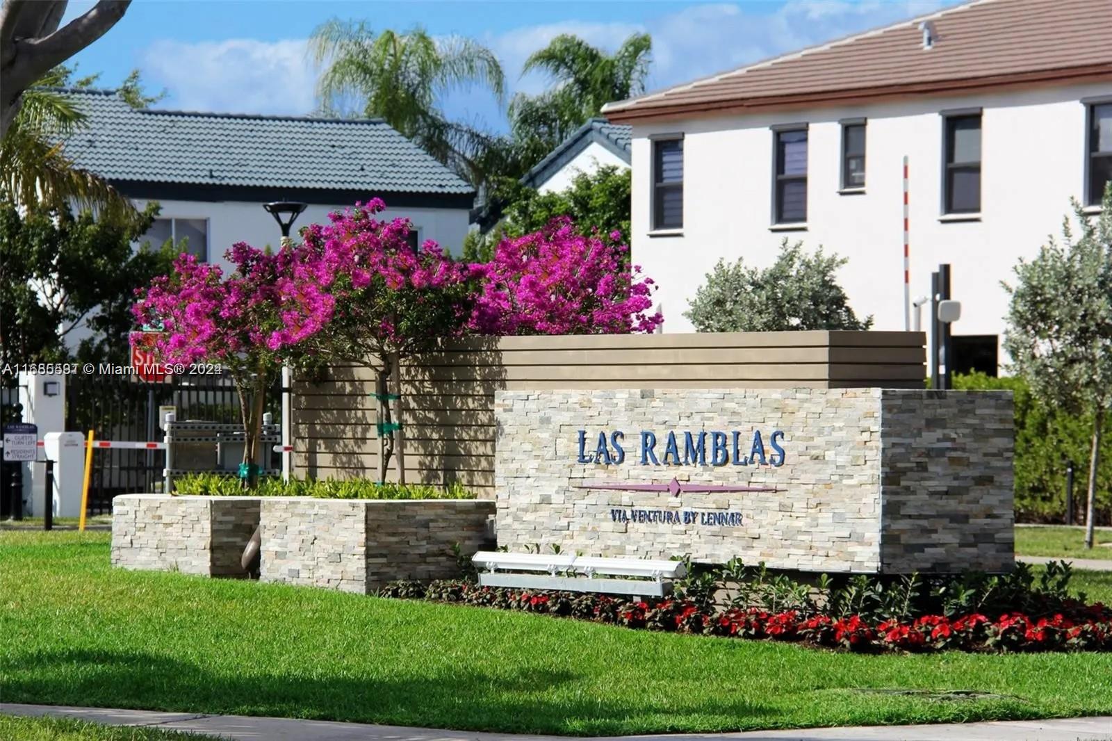 354 Northeast 210th Way Miami, FL 33179 - Photo 6 of 11 a sign on the side of a building