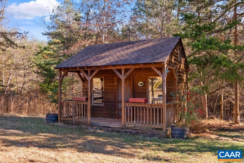 4844 Haden Martin Road Palmyra, VA 22963 - Photo 25 of 40 a view of a small house with yard and tree