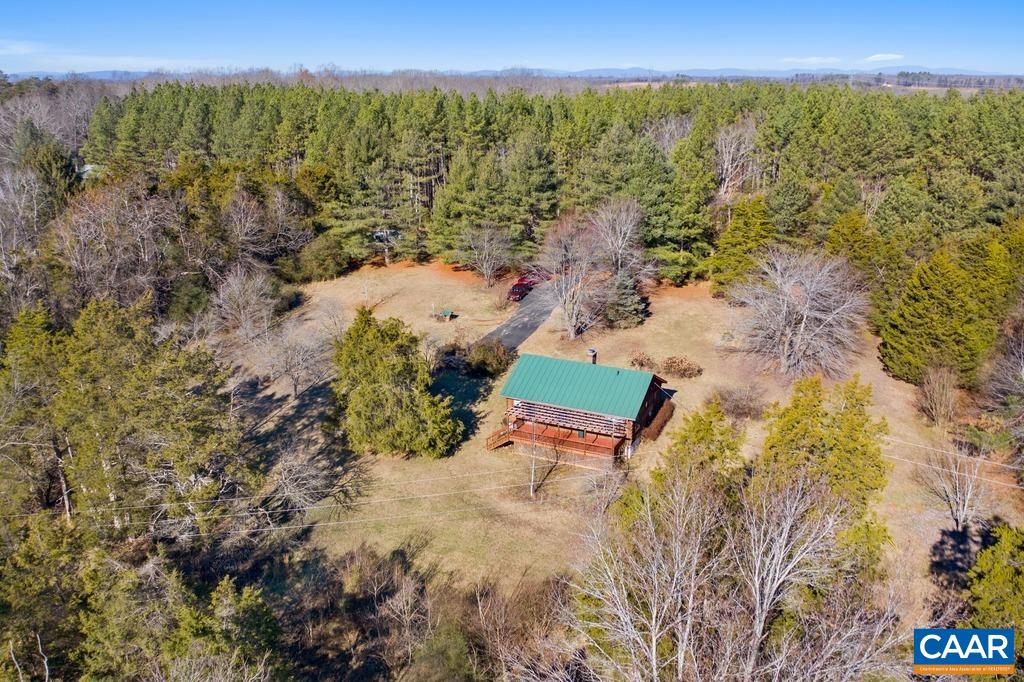 4844 Haden Martin Road Palmyra, VA 22963 - Photo 32 of 40 a view of a back yard from a lake